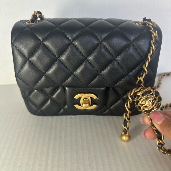 Chanel Black and Gold Crossbody Bag with Iconic Quilting - Picture 1 of 11